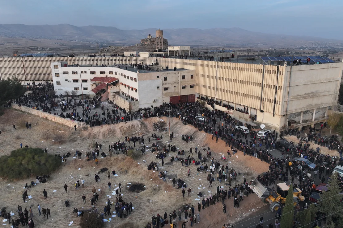 SYRIANS SEARCH FOR LOVED ONES: Thousands Gather Outside Notorious Prisons